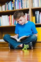 Image result for Little Boy Reading a Book On the Floor