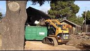 Most Productive Skid Steer Grapple Attachment Period Demo-Dozer! Dumpster Loading the easy way.