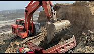 Hitachi Zaxis 670LCR & Caterpillar 352F Excavator Loading Trucks