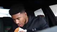 LowTierGod eating a burger with gunshot sound effects in the background