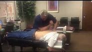 Houston Chiropractor & Palmer Graduate Dr Gregory Johnson Deep Tissue Work On Muscle Spasm