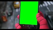 Spider-Man Checking Phone While Swinging - Green Screen