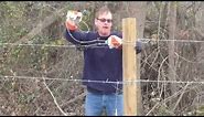 How To Use a barbed wire stretcher while building a fence