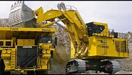 Komatsu PC3000 Hydraulic Excavator Dump Truck At Mining Site Mining machinery,excavator,dump truck