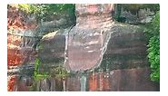 A wonder that stands the test of time: Believed to be the world's largest Buddha statue, the 71-meter-tall Giant Buddha of Leshan in SW China's Sichuan was carved into a rock on the mountain over a 90-year period during the Tang Dynasty (618–907).