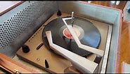 Motorola Stereo record player playing a record