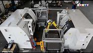 Robot cell with pallet changer based on Fanuc robot and two RAIS's CNC Lathe machines