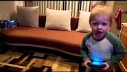 Toddler makes angry face when he dances