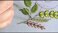 "Captivating Floral Embroidery: Learn to Make a Yellow Flower on Fabric"
