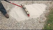 brushing CHEAP concrete onto a gravel driveway (adding strength and resilience)