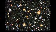 Zoom and pan of Hubble's colourful view of the Universe