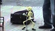 Skeleton puppet dances the twist