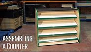 How to assemble a Shop Counter - assembly step by step video guide - Shelving4shops