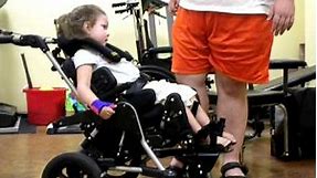 Kenzie in a Kids Rock wheelchair