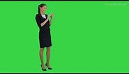 Girl walking with smartphone Green Screen Footage