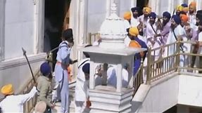 WATCH: Sword-wielding Sikhs clash at India's Golden Temple