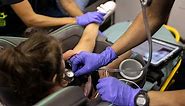 US reaches 100M COVID-19 cases as hospitals battle ‘tripledemic’