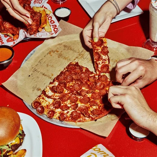 Your pizza cravings? Solved. Donatos Pizza is available at select locations! | Red Robin Gourmet Burgers
