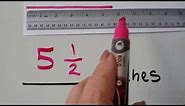 Grade 2 Math 8.14, Nearest half-inch measure