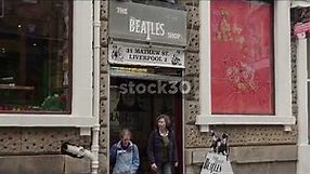 The Beatles Shop Followed By Mathew Street Sign, Liverpool, UK