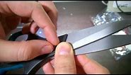 fixing a pair of scissors