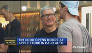 Tim Cook visits Apple Store as new iPhones go on sale