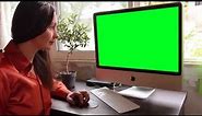 Woman Using Computer With Green Screen Display Free stock footage By Nelson Noman