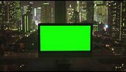 Desktop Computer Green Screen Standing on the Desk with the Background of City | 4K | FREE TO USE