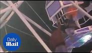 Family fall from ferris wheel carriage after it spins upside down