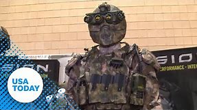 Military suit with suspended armor, computer makes debut