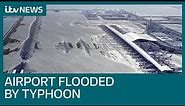 Typhoon slams into western Japan, flooding airport | ITV News