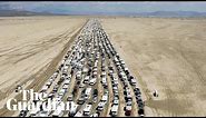 Drone video shows vehicles leaving Burning Man festival after days stranded in thick mud