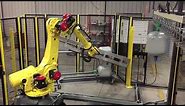 Automated Well Tank Handling System with FANUC R-2000iC Robot - Motion Controls Robotics