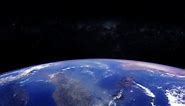 Planet earth view from space animation with milky way stars in background. Contains public domain image by Nasa