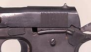 Flak-Damaged M1911 .45-Cal Pistol