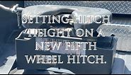 Setting fifth wheel tow height on a new hitch.