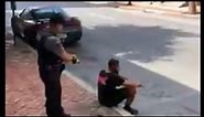 Video shows officer using stun gun on man sitting on sidewalk