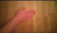 Hand hitting wooden table sound effect.