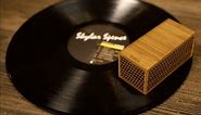 This block is a tiny spinning record player