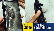 Samsung Note7 customer shows charred remains of phone after it caught fire