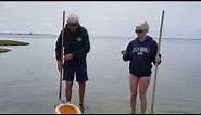 Raking for clams on Sedge Island, Island Beach State Park