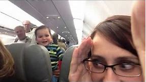 Laughing Baby on Airplane -- So Cute!!
