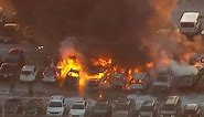 Firefighters battle multiple-car blaze at airport parking garage