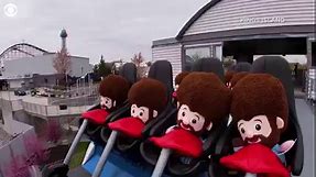 Bob Ross dolls go for a rollercoaster ride