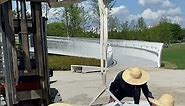Installation process for a curved translucent concrete sitting bench in a park