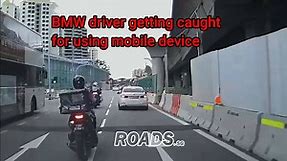 BMW driver caught for using mobile device