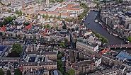 Premium stock video - Amsterdam netherlands aerial v33 high angle birds eye view drone fly across de wallen and nieuwmarkt en lastage neighborhoods capturing beautiful cultural rich cityscape - august 2021