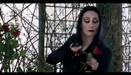 Addams Family-Morticia cuts heads off roses