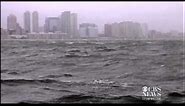 Hurricane Sandy pushing water over Manhattan seawall