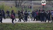Migrants clash with Bosnian police while trying to cross the border into Croatia